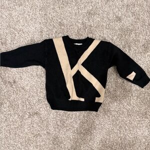 Boys size 18 month Black and Tan Sweater with Bold K Letter Design